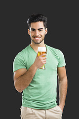 Image showing Young man drinking beer