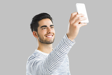 Image showing Handsome man making a selfie