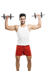 Image showing Athletic man lifting weights