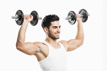 Image showing Athletic man lifting weights