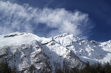 Image showing View on off-piste ski slope at sun windy day