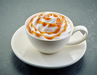 Image showing caramel latte coffee with whipped cream