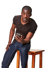Image showing Portrait of african man talking on the phone