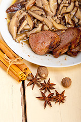 Image showing venison deer game filet and wild mushrooms