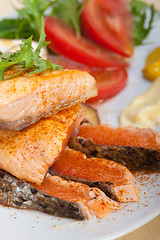 Image showing grilled samon filet with vegetables salad