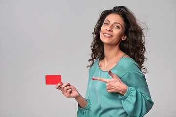 Image showing Business woman holding credit card