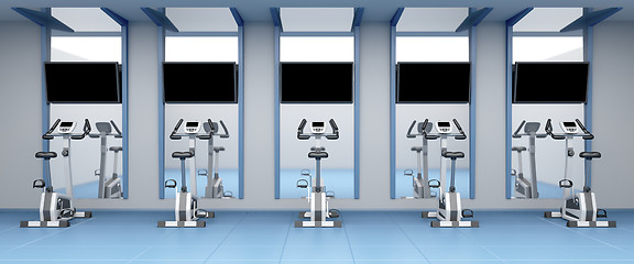 Image showing Stationary bicycles in gym