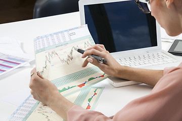 Image showing Young Businesswoman Looking at Computer Seriously