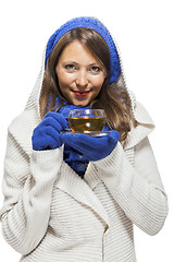 Image showing Fashionable young woman sipping hot tea