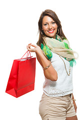 Image showing Fashionable Woman Looking Inside a Shopping Bag