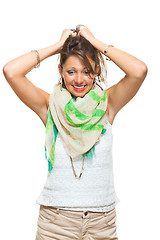 Image showing Laughing Pretty Woman Holding Back her Hair