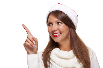 Image showing Attractive smiling woman in a Santa hat