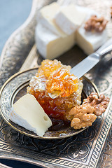 Image showing Honey comb, cheese and walnuts.