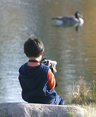 Image showing boy with video camera