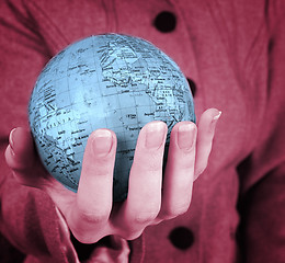 Image showing Globe in a girl's hands