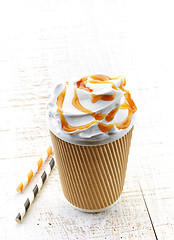 Image showing caramel latte coffee with whipped cream