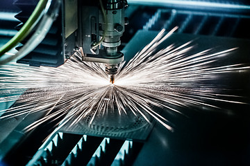 Image showing CNC Laser cutting of metal, modern industrial technology.