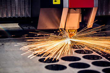 Image showing CNC Laser cutting of metal, modern industrial technology.