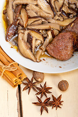 Image showing venison deer game filet and wild mushrooms