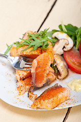 Image showing grilled samon filet with vegetables salad