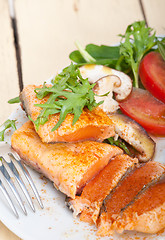 Image showing grilled samon filet with vegetables salad