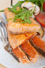 Image showing grilled samon filet with vegetables salad