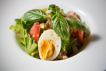 Image showing plate of spring mix salad with strawberry, eggs and tuna