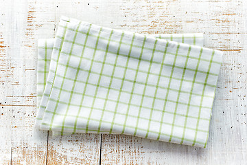 Image showing cotton napkin on white wooden table