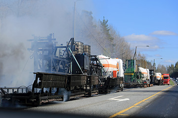 Image showing Machine Laying Asphalt Concrete at Roadworks