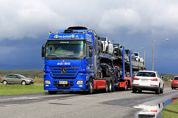 Image showing Mercedes-Benz Actros Car Carrier Hauls New Cars in Traffic