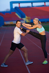 Image showing sporty woman on athletic race track