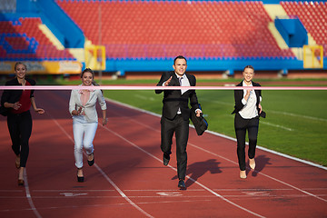 Image showing business people running on racing track