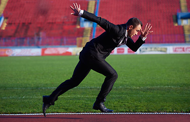 Image showing business man ready to sprint