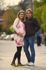 Image showing young pregnant couple have fun and relax