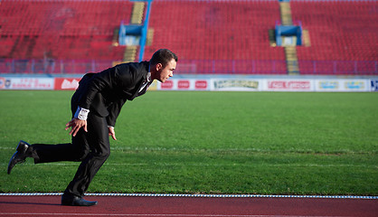 Image showing business man ready to sprint