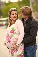 Image showing young pregnant couple have fun and relax