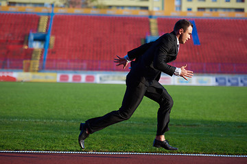 Image showing business man ready to sprint