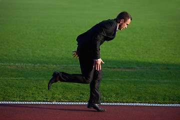 Image showing business man ready to sprint