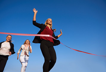 Image showing business people running on racing track