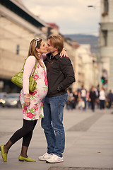 Image showing young pregnant couple have fun and relax