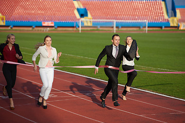 Image showing business people running on racing track