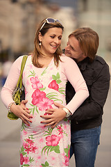 Image showing young pregnant couple have fun and relax