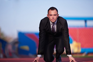 Image showing business man ready to sprint