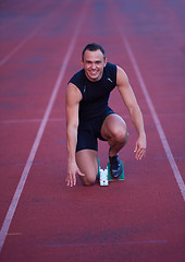 Image showing Athletic man start