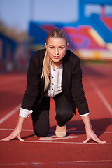 Image showing business woman ready to sprint