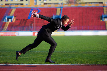 Image showing business man ready to sprint