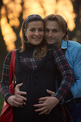 Image showing young pregnant couple have fun and relax