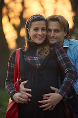 Image showing young pregnant couple have fun and relax