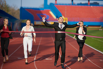 Image showing business people running on racing track