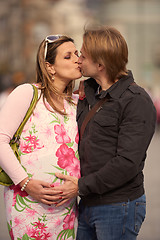 Image showing young pregnant couple have fun and relax